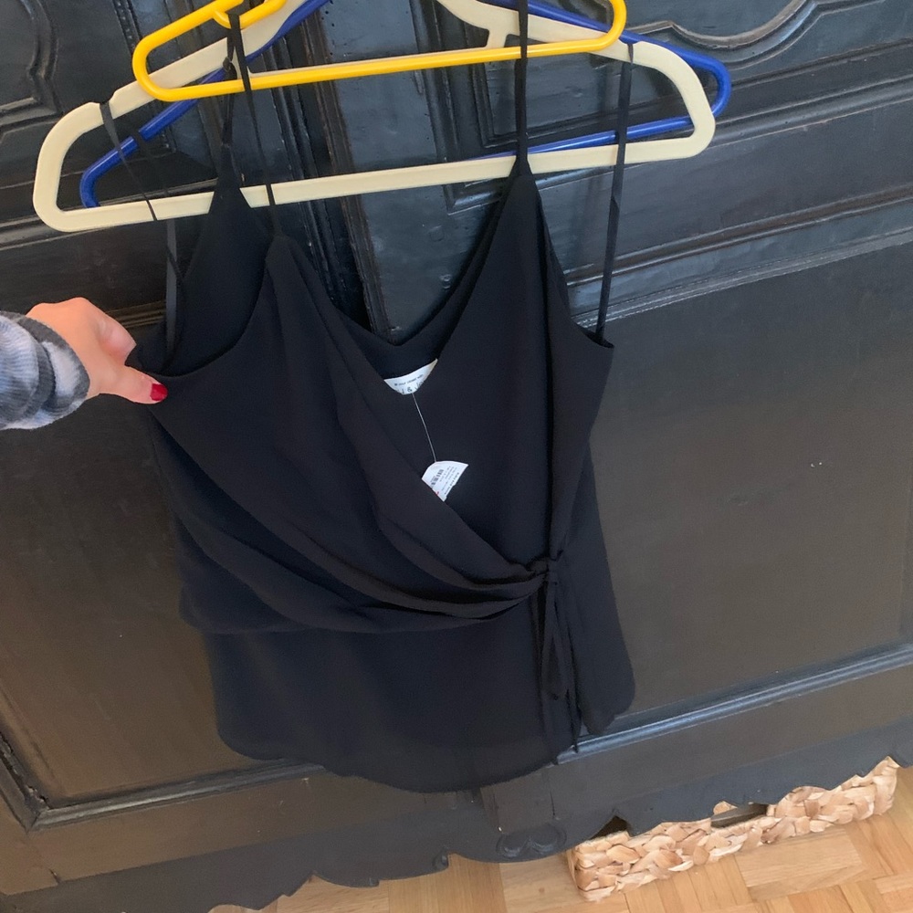 Black sleeveless blouse